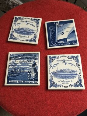 Set of vintage blue and white ceramic tile coasters featuring ships